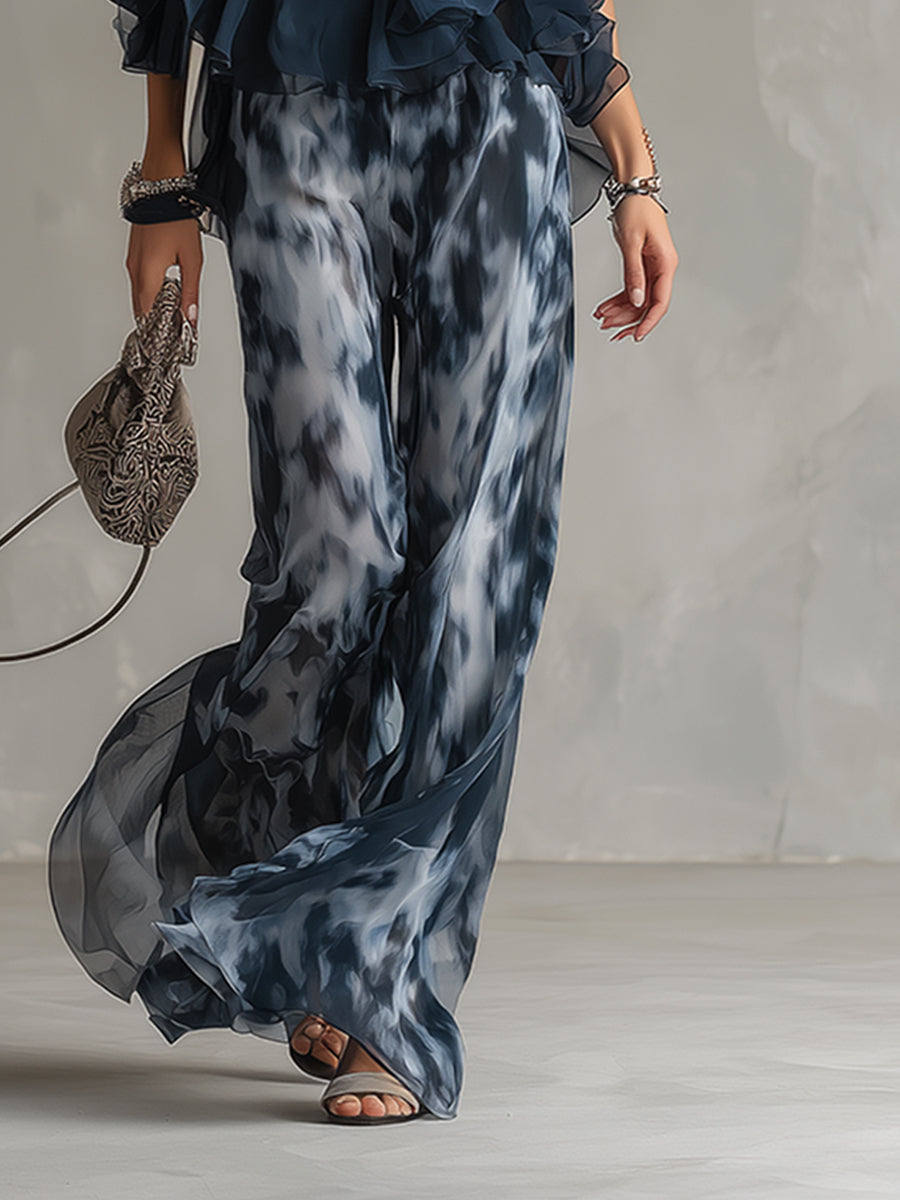 Luisa - Robe élégante en mousseline composée d'un haut à col montant et d'un pantalon large à motifs.